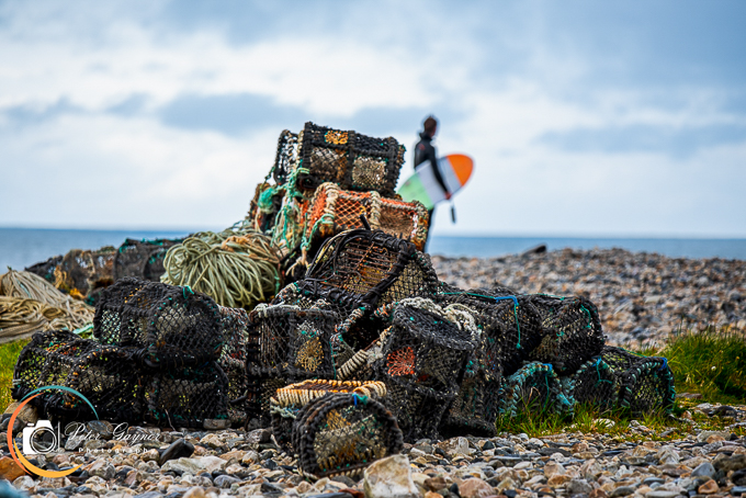 Lobster Pots andSurfer - Tory Island Ferry Port